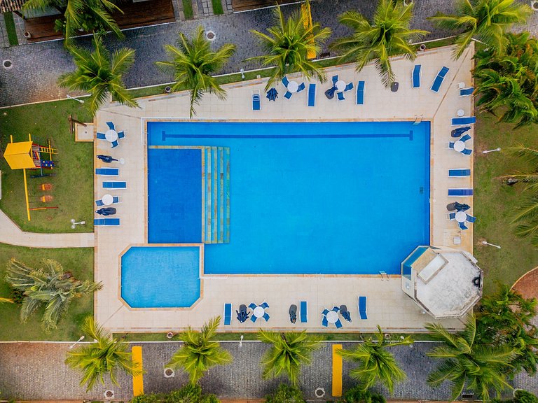 300m da Praia, casa 4 suítes, churrasqueira em Condomínio.